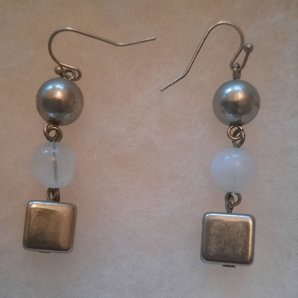Silver and blue dangly earrings